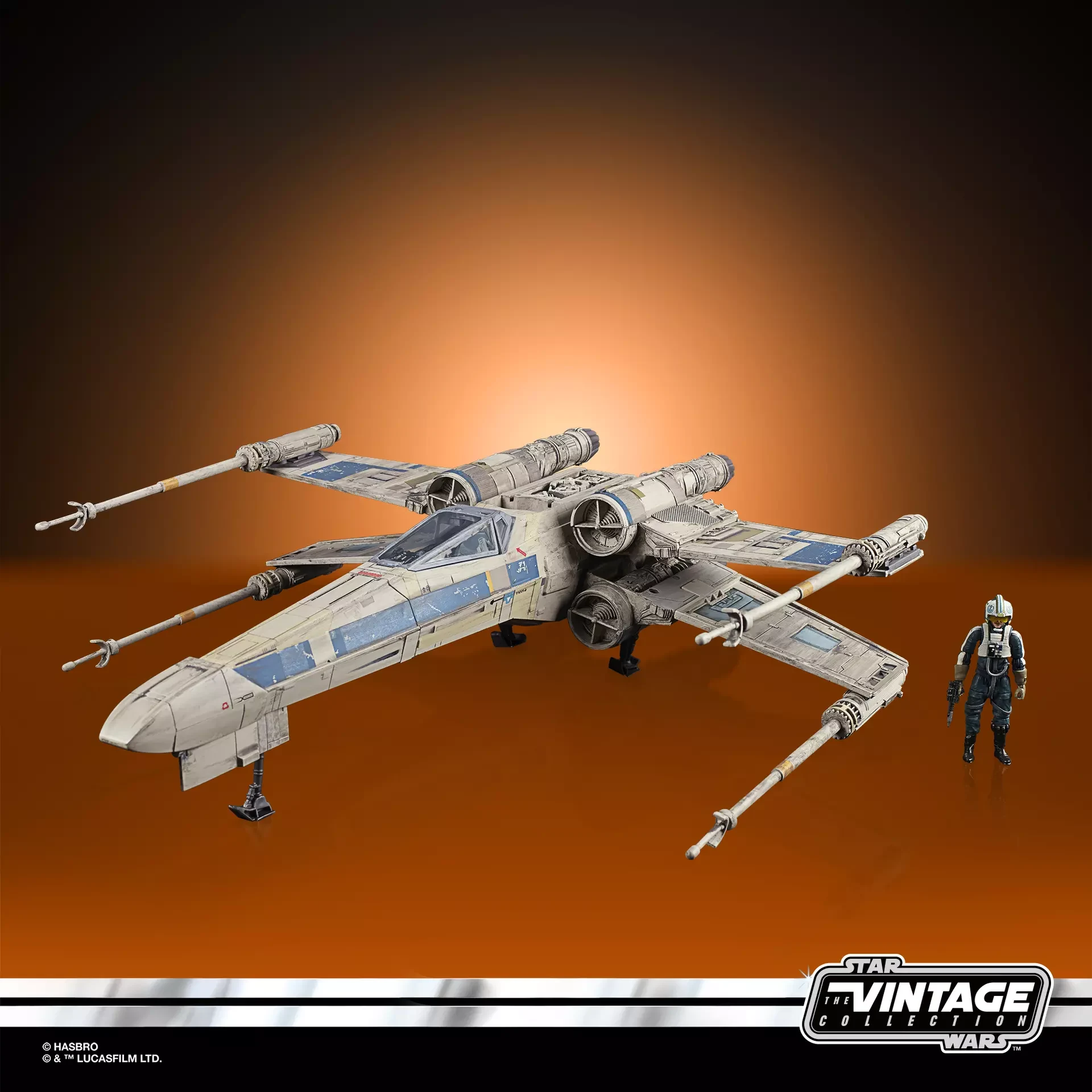 Antoc Merrick’s blue and gray X-Wing Fighter displayed with the Antoc Merrick action figure