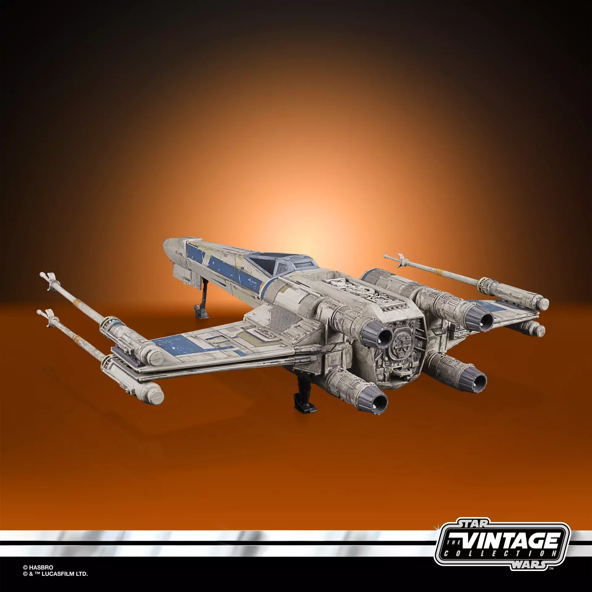 Antoc Merrick’s blue and gray X-Wing Fighter shown from the rear