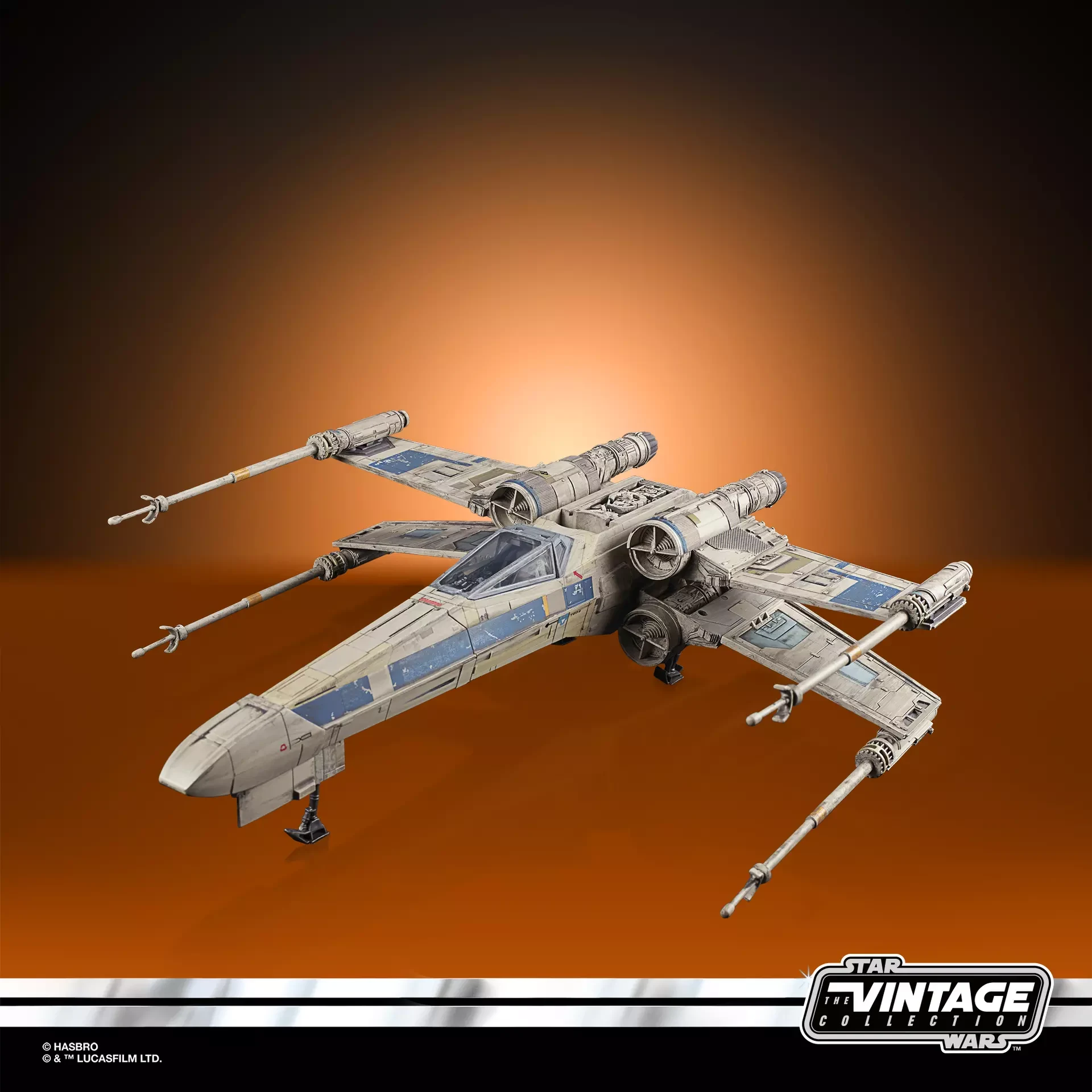 Antoc Merrick’s blue and gray X-Wing Fighter displayed with its S-foils open